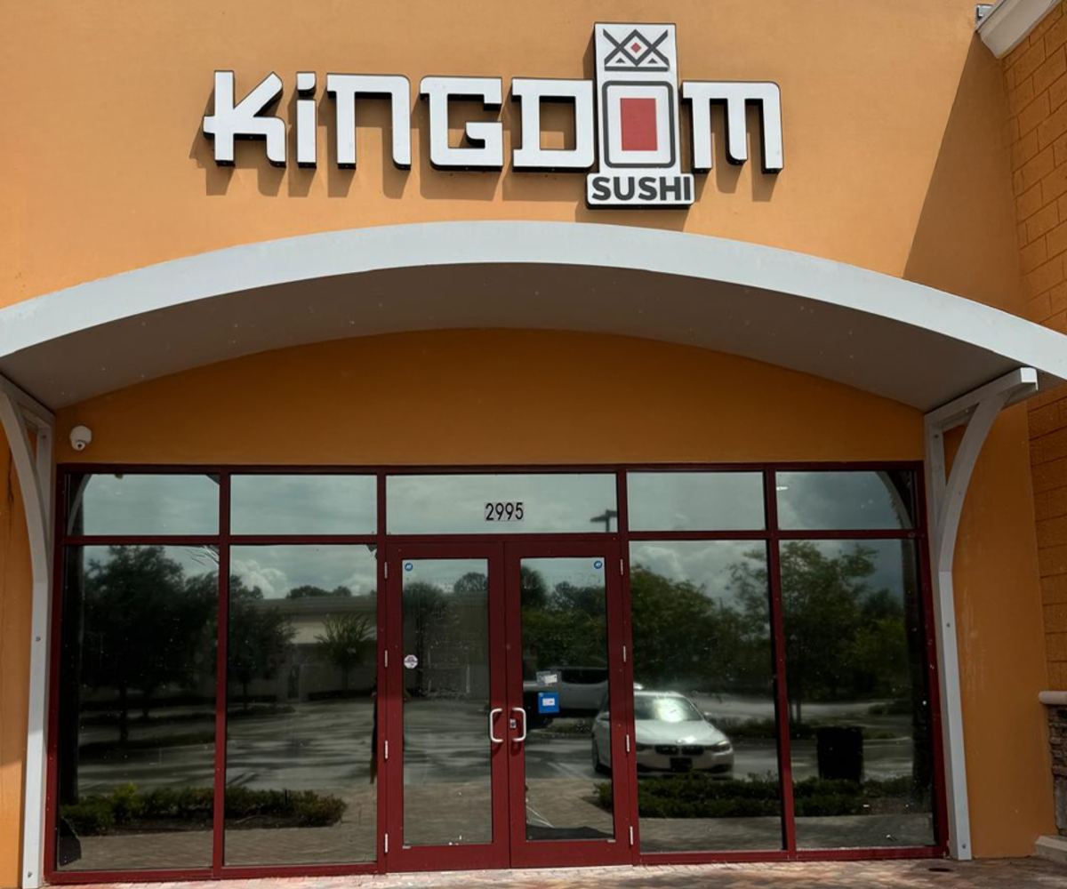 The exterior of the new Kingdom Sushi restaurant in Port St. Lucie, showcasing the modern design and logo.