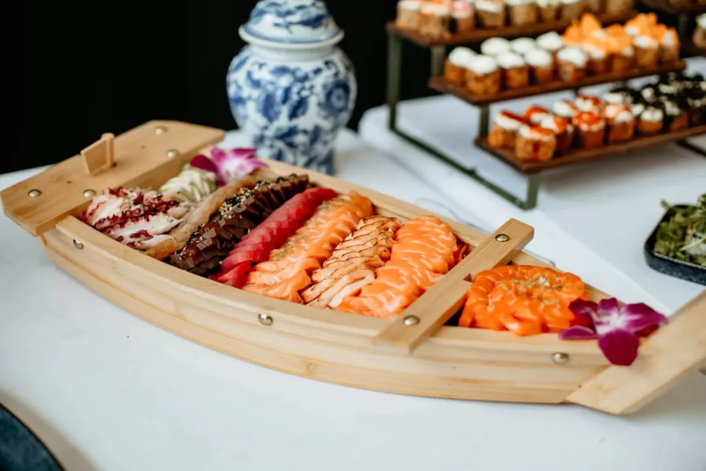 À la carte sashimi boat with assorted fresh fish at Kingdom Sushi.